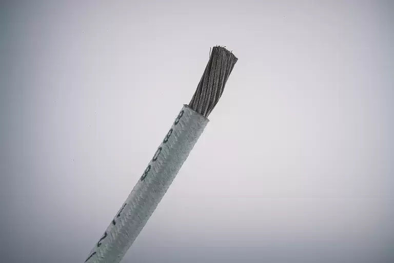 8808 Black wire inside wrapper of gray color.